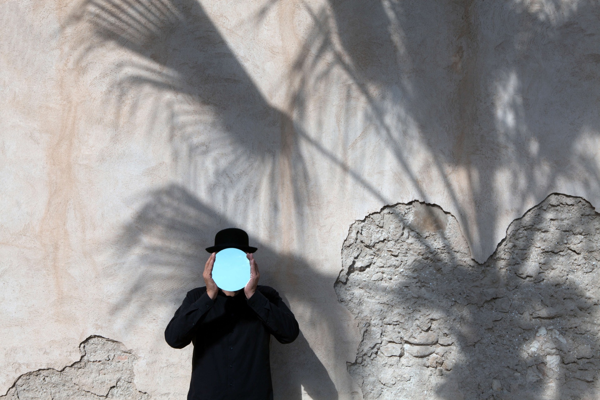 Person surrounded by expressive abstract textures